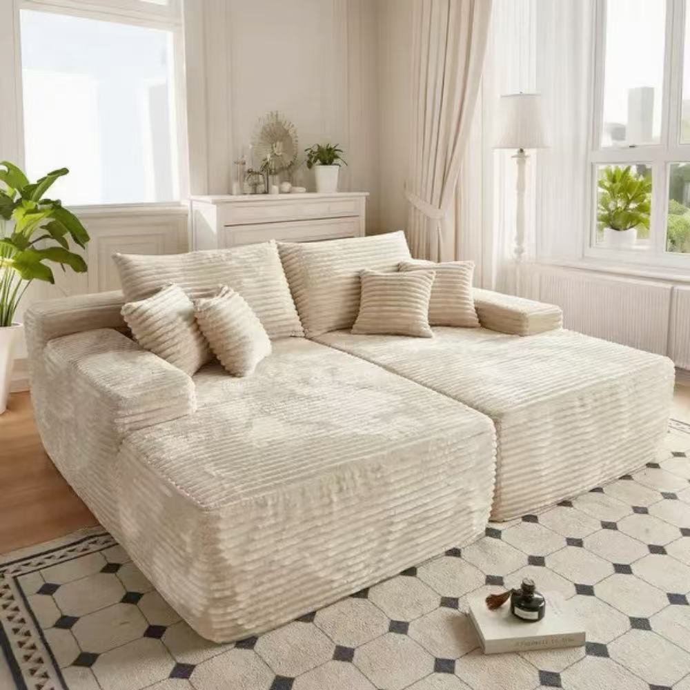 Oversized corduroy convertible sofa bed with easy pull-out design in a modern living room