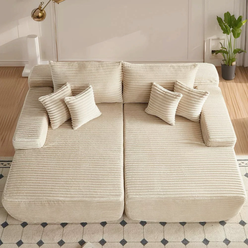 Oversized corduroy convertible sofa bed with easy pull-out design in a modern living room