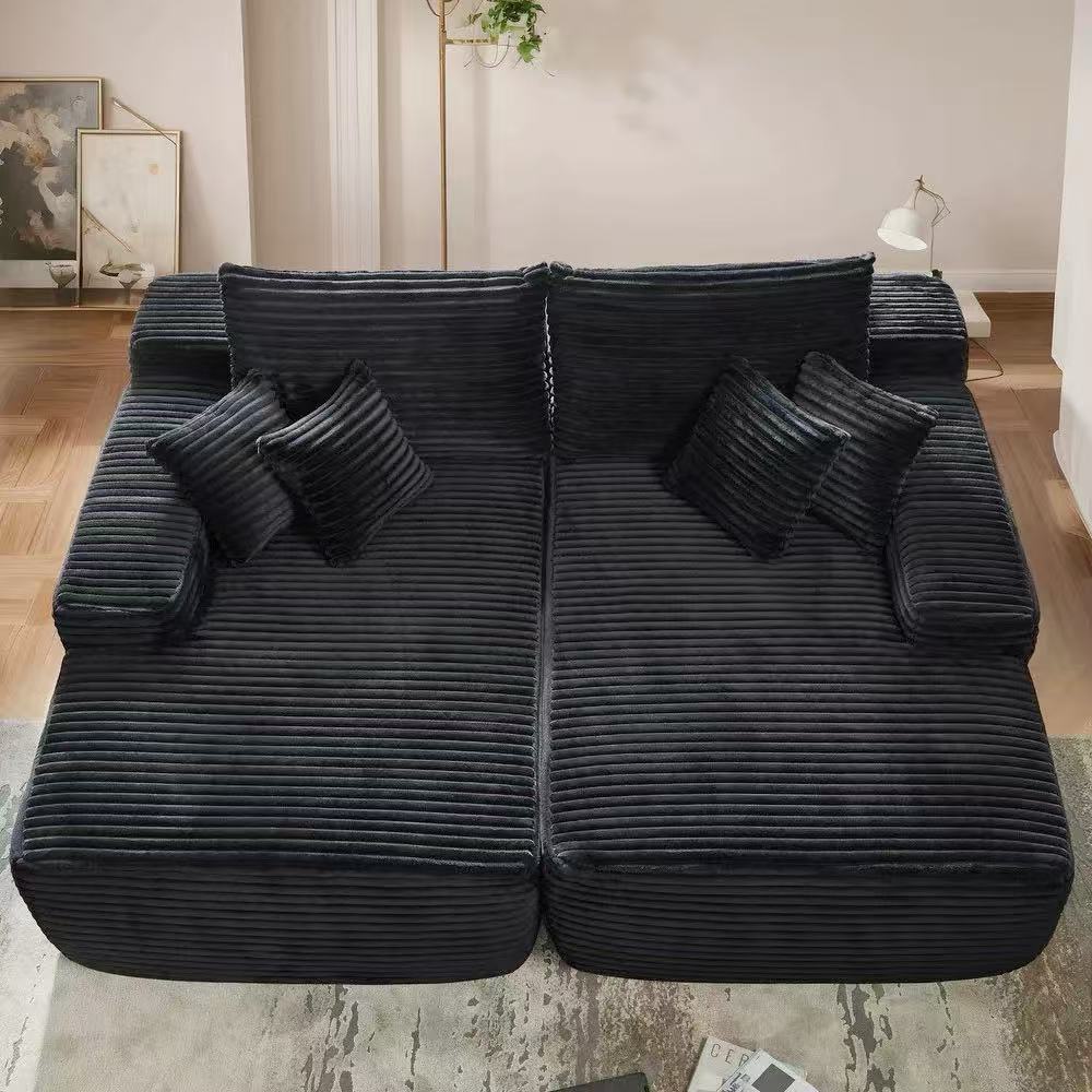 Oversized corduroy convertible sofa bed with easy pull-out design in a modern living room