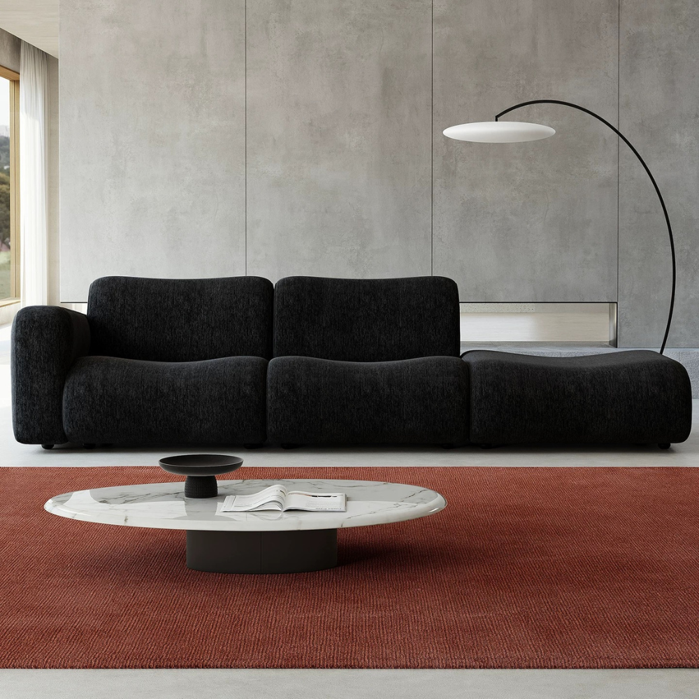 Black modular lamb wool sofa—vacuum‑packed single‑block or sectional layout in plush lamb wool. Ideal for modern living rooms, studios, and guest spaces.