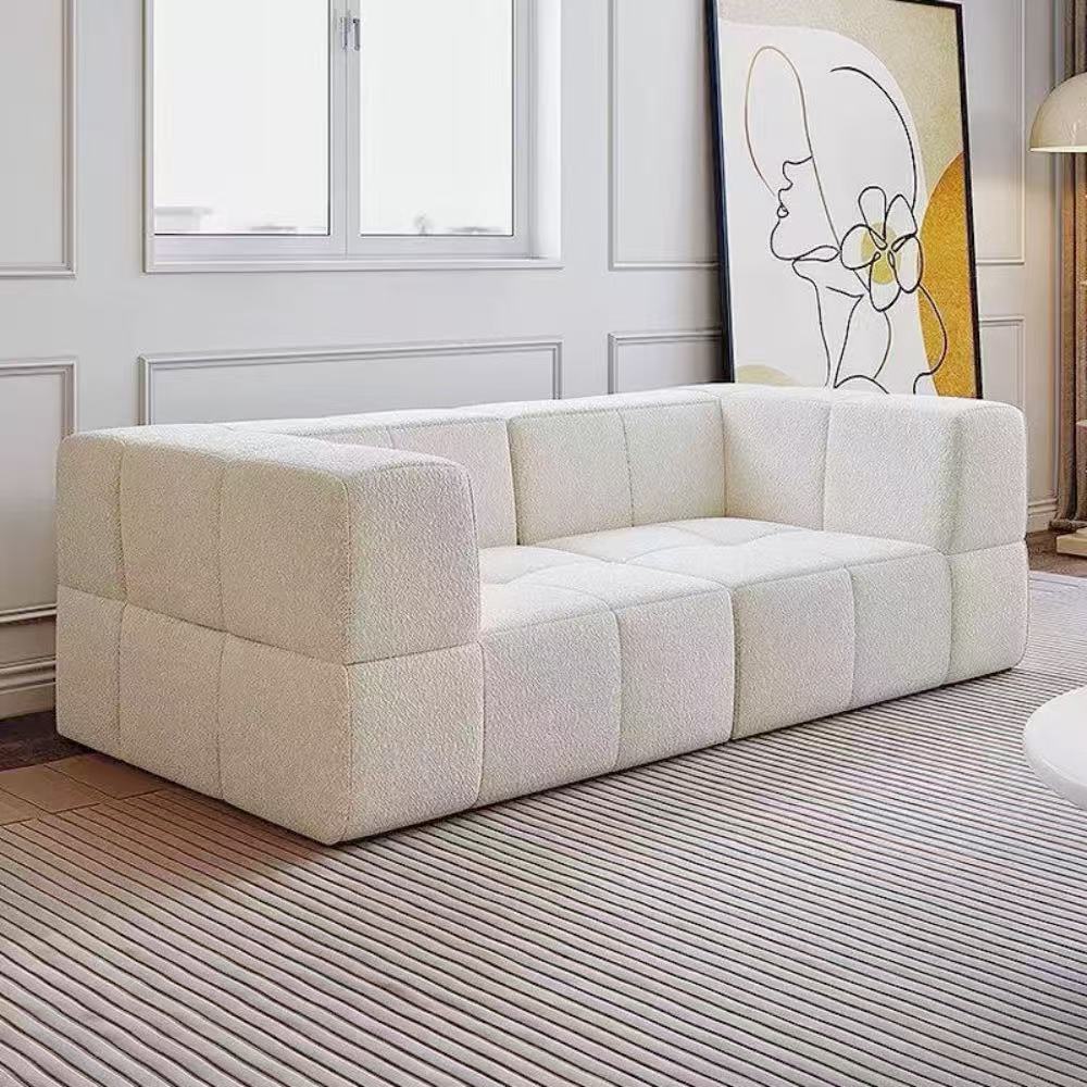 Bubble Block modular sofa blocks in soft boucle fabric—customizable block seating that adapts to any living room or studio configuration.