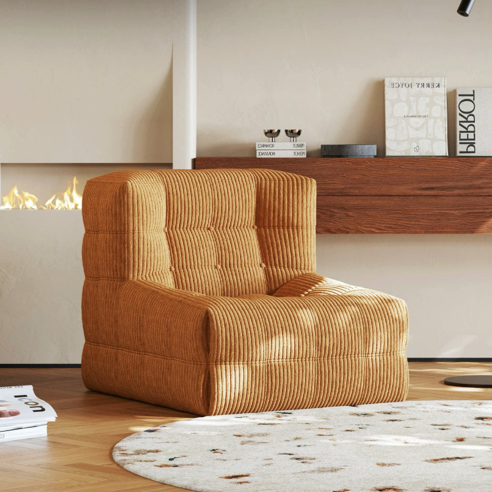 Quilted marshmallow‑style compressed sofa in plush corduroy bouclé—compact cozy seating ideal for small living rooms and guest areas.