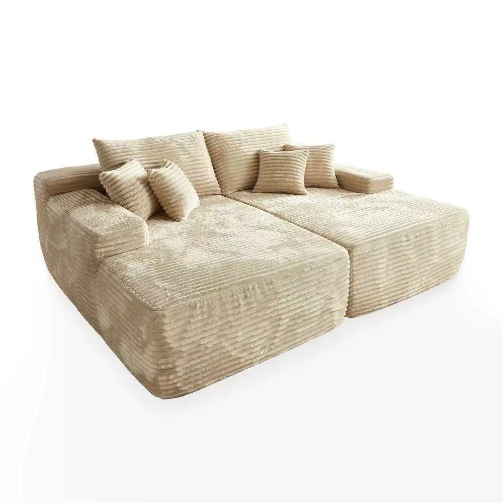 Oversized corduroy convertible sofa bed with easy pull-out design in a modern living room