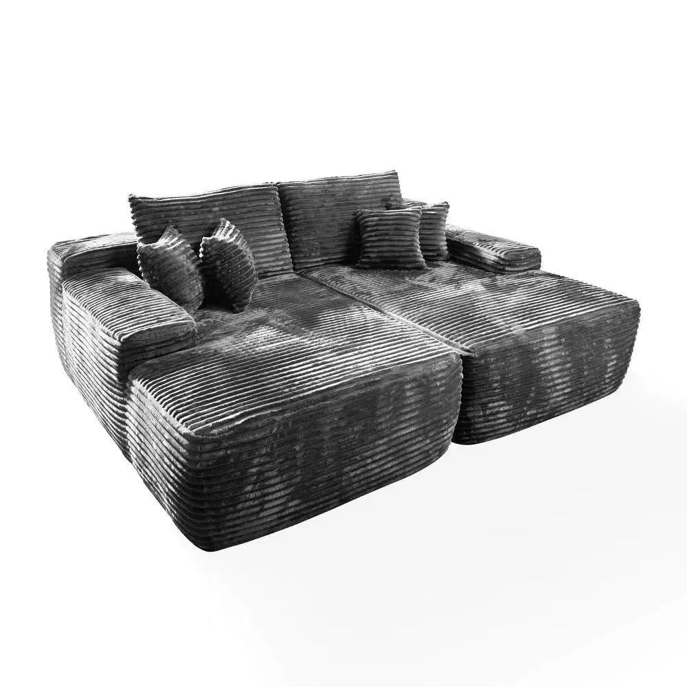 Oversized corduroy convertible sofa bed with easy pull-out design in a modern living room