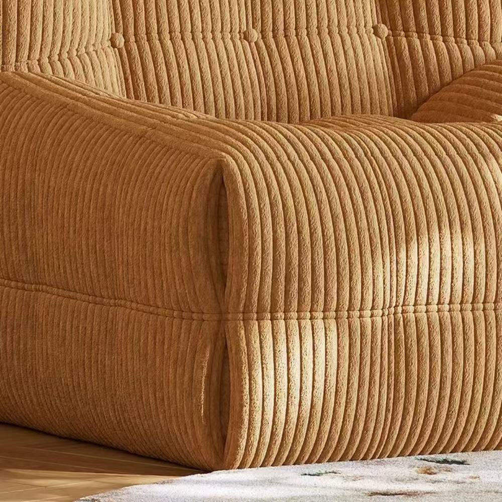 Quilted marshmallow‑style compressed sofa in plush corduroy bouclé—compact cozy seating ideal for small living rooms and guest areas.