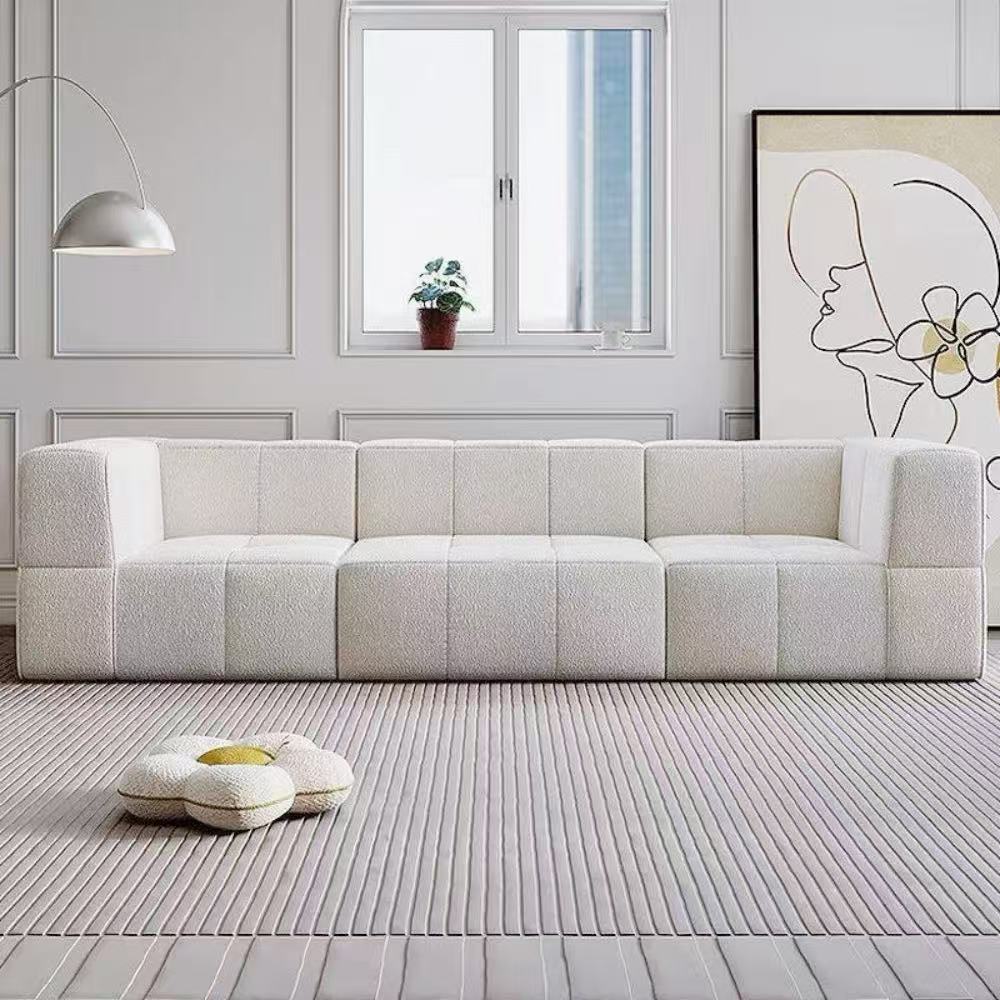 Bubble Block modular sofa blocks in soft boucle fabric—customizable block seating that adapts to any living room or studio configuration.