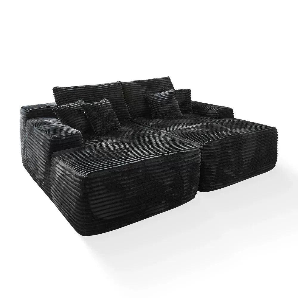 Oversized corduroy convertible sofa bed with easy pull-out design in a modern living room