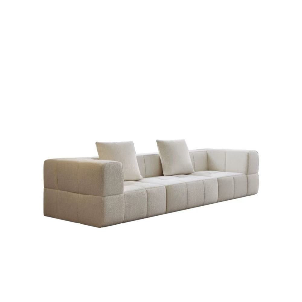 Bubble Block modular sofa blocks in soft boucle fabric—customizable block seating that adapts to any living room or studio configuration.