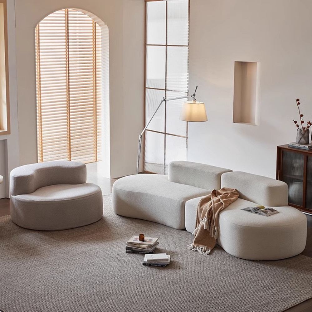 Wave-shaped teddy velvet sofa in white/brown/green—plush curvy design, vacuum-packed single or multi-seat options, ideal for living rooms, studios and guest areas.