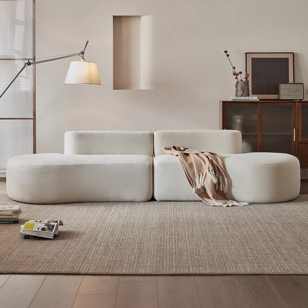 Wave‑shaped teddy velvet sofa in plush white—vacuum‑packed for easy delivery. Available in single, 2‑seat and 3‑seat sizes. Stylish curved design perfect for living rooms, guest rooms & studios.