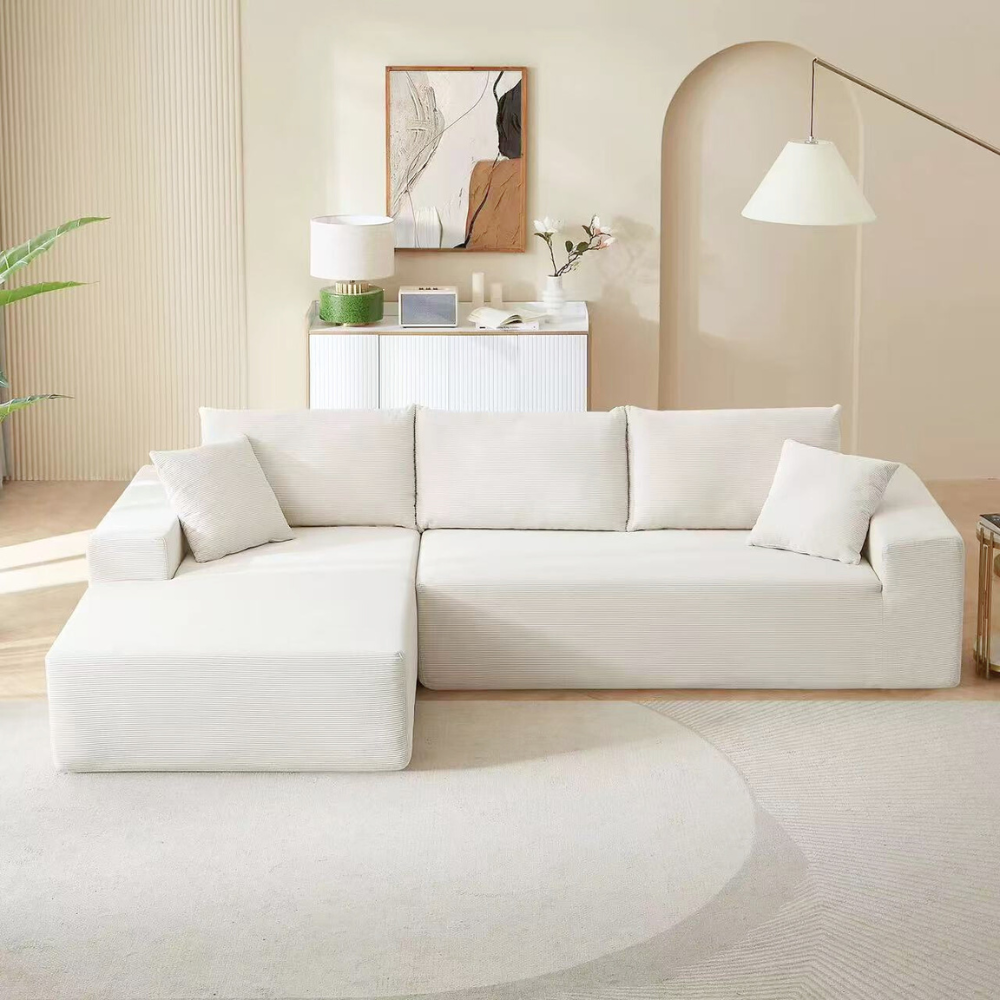 Modular compressed sofa in plush teddy or corduroy—vacuum‑packed single block or sectional layout, cozy and easy to transport for living room, studio or guest rooms.