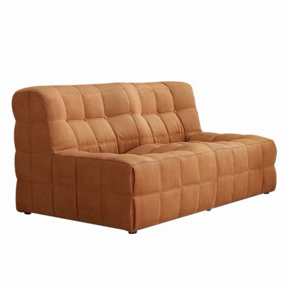 Quilted marshmallow‑style compressed sofa in plush corduroy bouclé—compact cozy seating ideal for small living rooms and guest areas.
