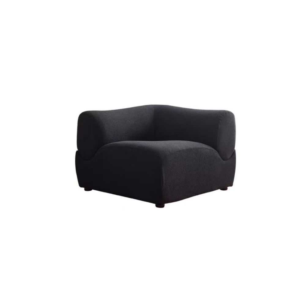 Black modular lamb wool sofa—vacuum‑packed single‑block or sectional layout in plush lamb wool. Ideal for modern living rooms, studios, and guest spaces.
