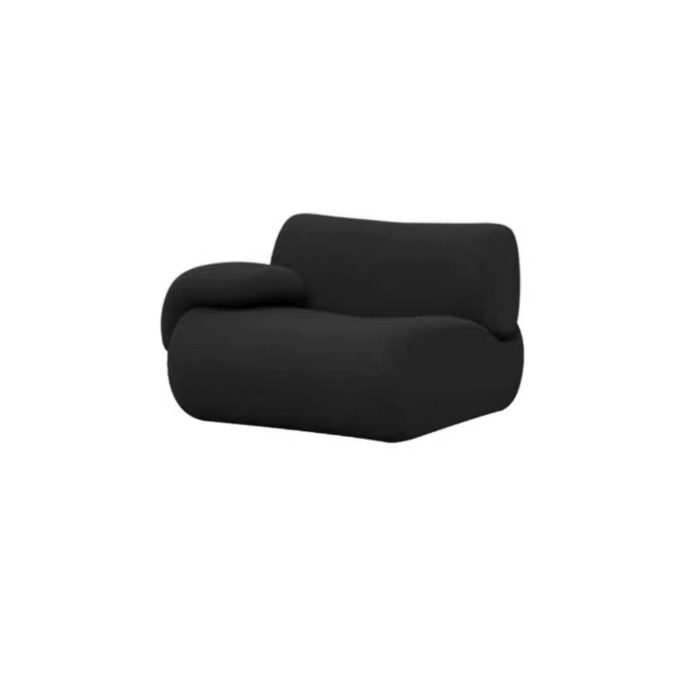 Black modular lamb wool sofa—vacuum‑packed single‑block or sectional layout in plush lamb wool. Ideal for modern living rooms, studios, and guest spaces.