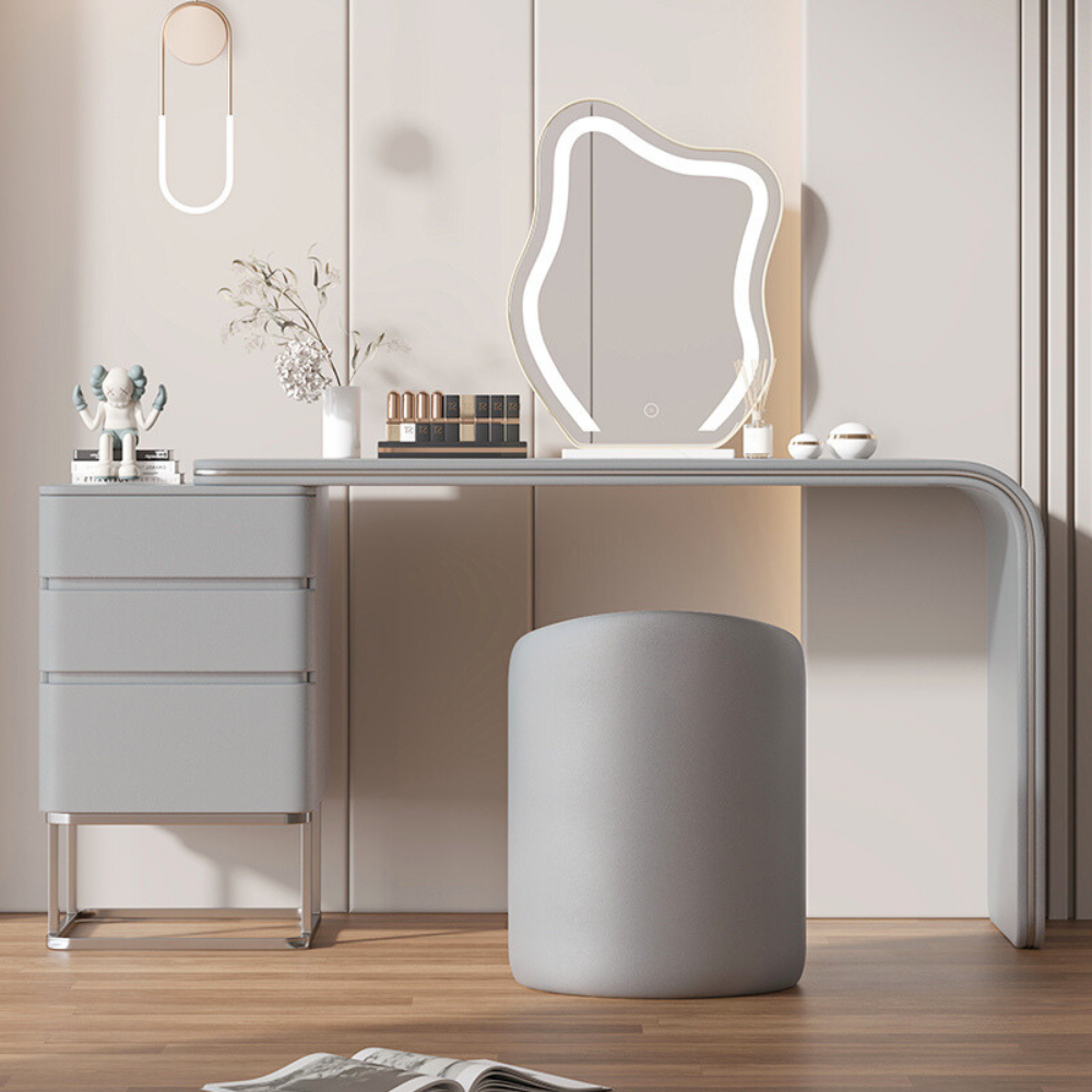 Hidden drawer cloud mirror vanity desk with lighted cloud-shaped mirror, spacious tabletop, smooth drawers, and padded stool in neutral tones.