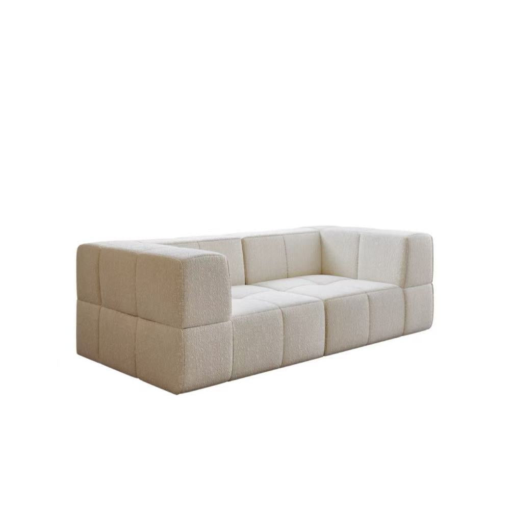 Bubble Block modular sofa blocks in soft boucle fabric—customizable block seating that adapts to any living room or studio configuration.