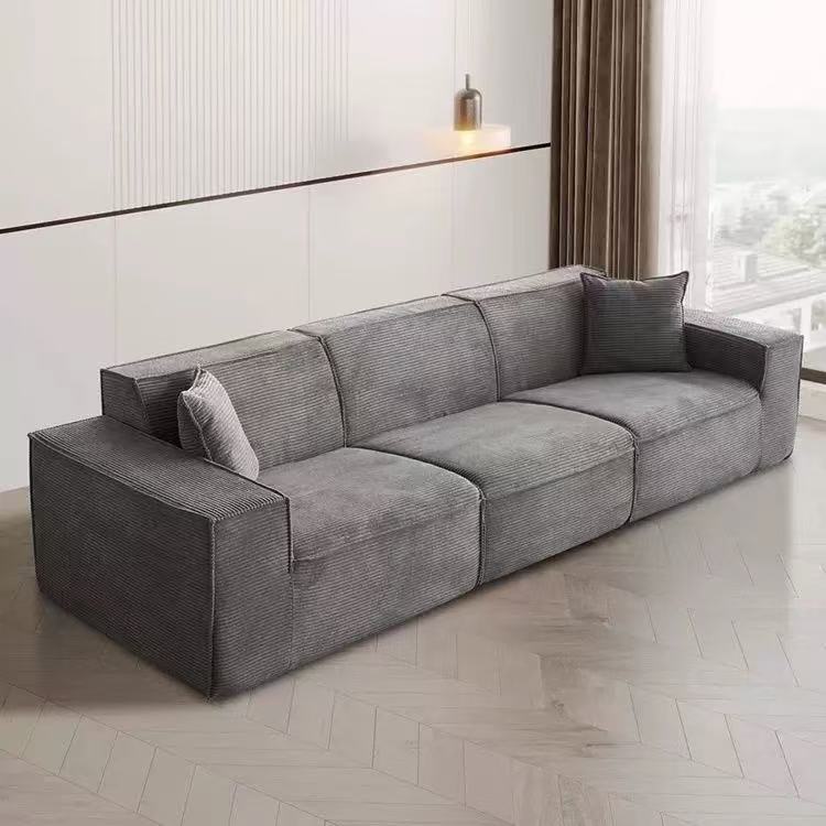 Modular corduroy sofa set in dark grey—vacuum‑packed single-block or sectional seating in plush durable corduroy. Ideal for living rooms, studios, and guest rooms.