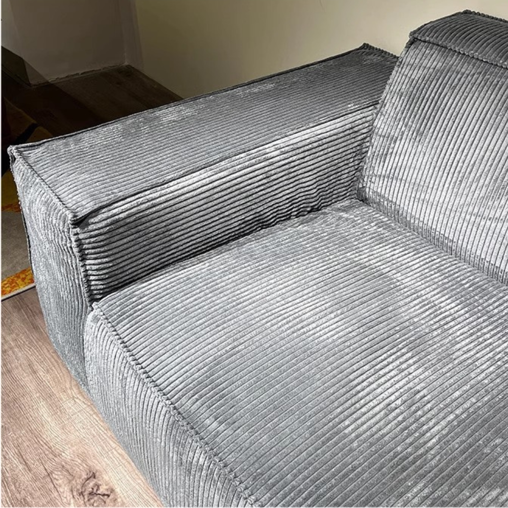 Modular corduroy sofa set in dark grey—vacuum‑packed single-block or sectional seating in plush durable corduroy. Ideal for living rooms, studios, and guest rooms.