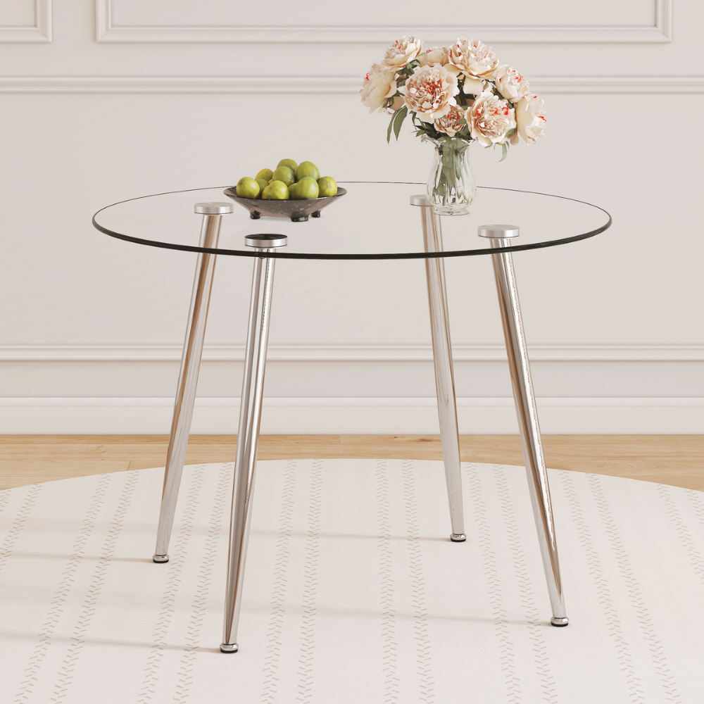 Modern round glass dining table with 39.7″ tempered glass top and slanted metal legs in silver or gold, minimalist space‑saving design, easy to clean.