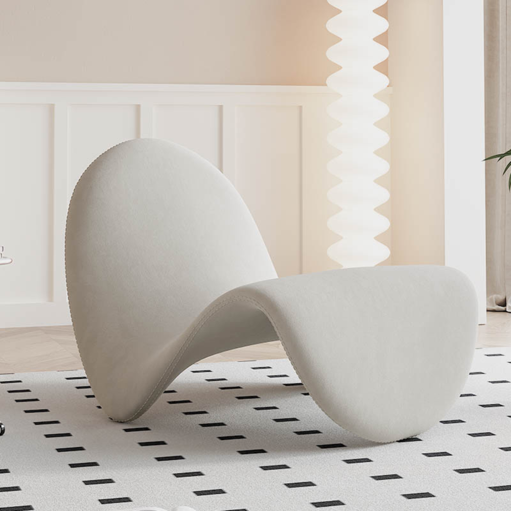 Homiyu sculptural wave lounge chair with soft sherpa or suede upholstery, modern curved silhouette as a statement art piece in living space.