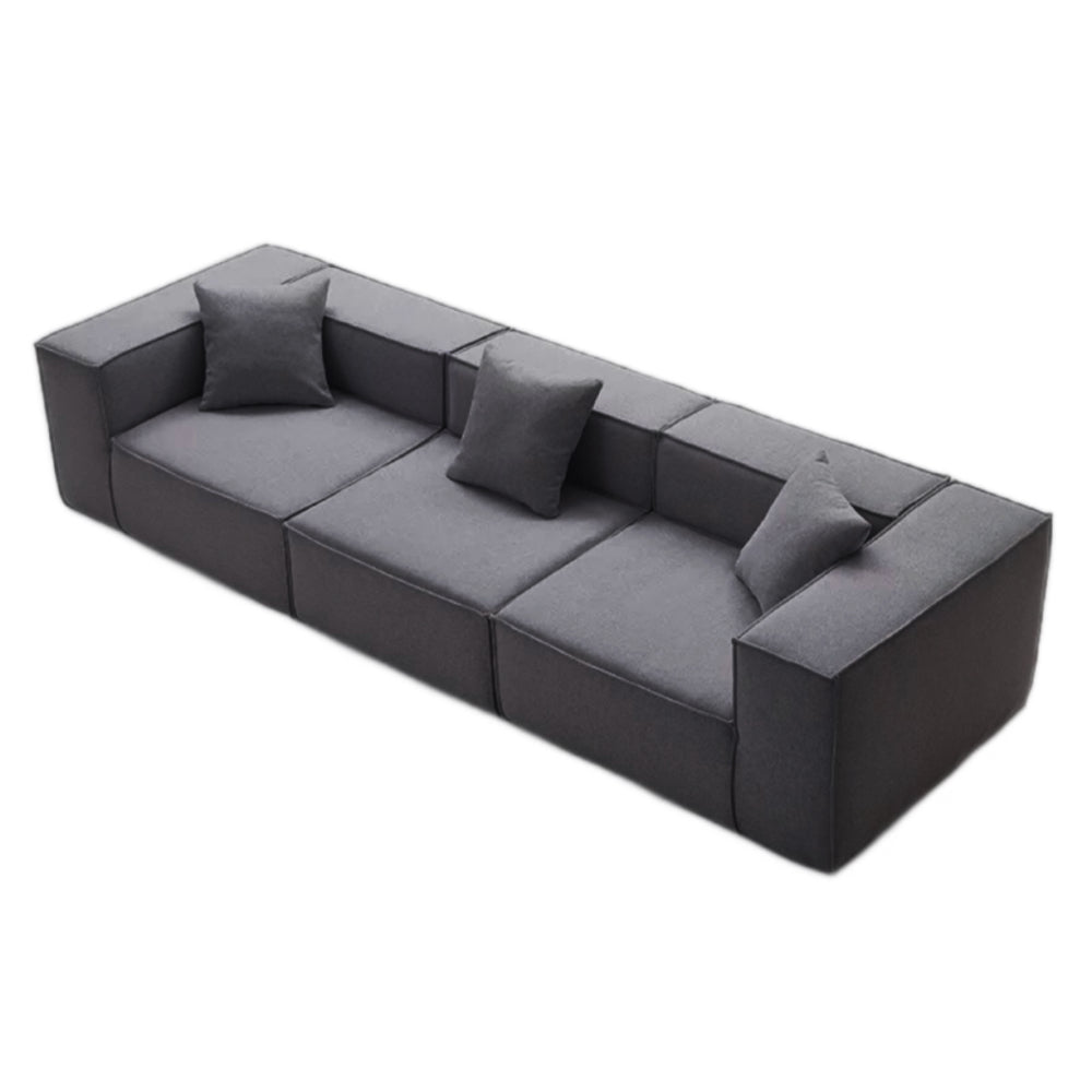 Fully Compressed Large Sofa modular sectional in corduroy or linen, earthy tone, modern minimalist design, deep seating, versatile layout, close-up of texture and stitching.
