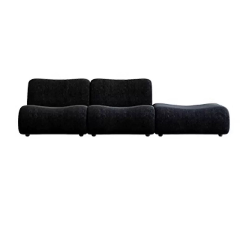 Black modular lamb wool sofa—vacuum‑packed single‑block or sectional layout in plush lamb wool. Ideal for modern living rooms, studios, and guest spaces.